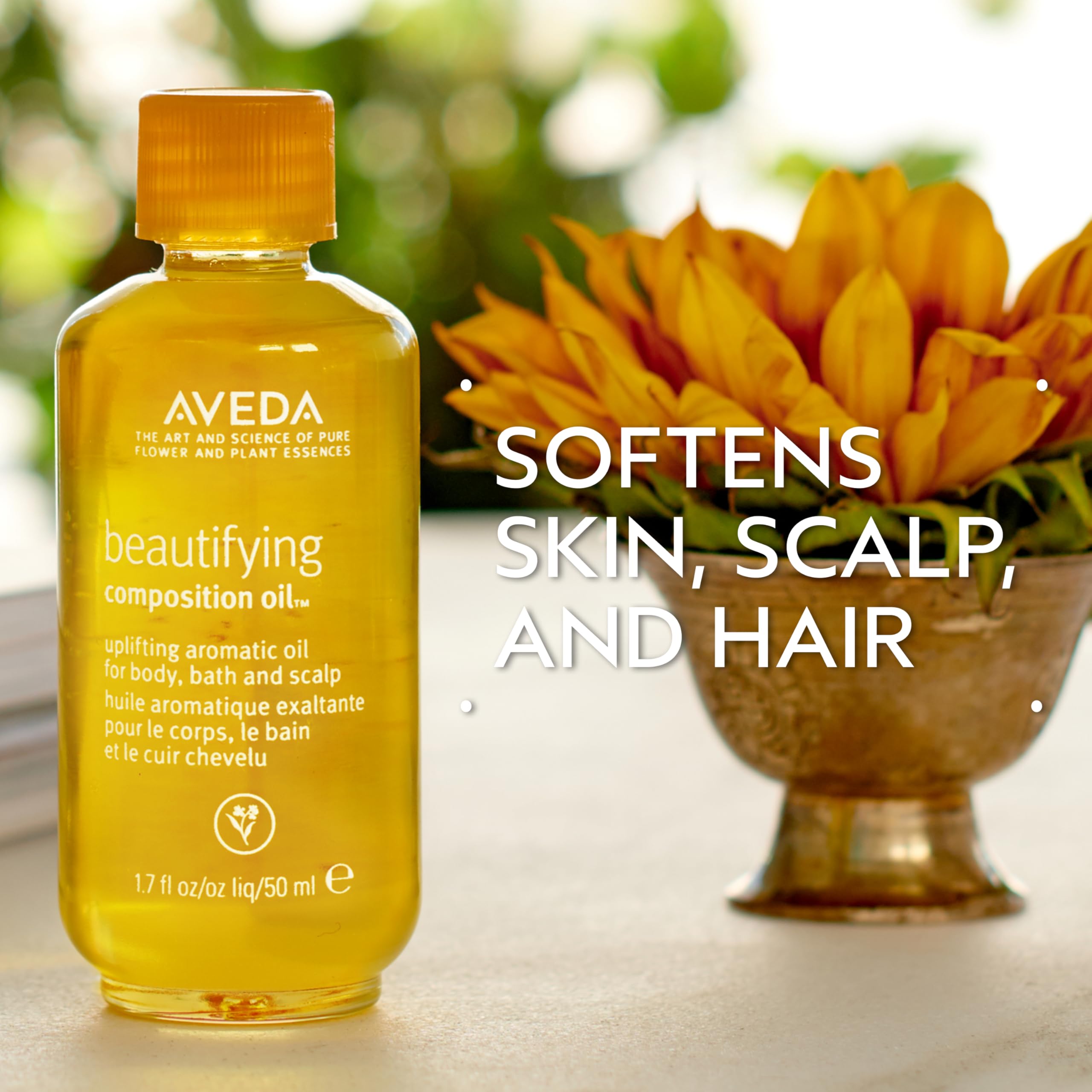 Aveda Beautifying Composition Oil applied to the body for moisturized skin