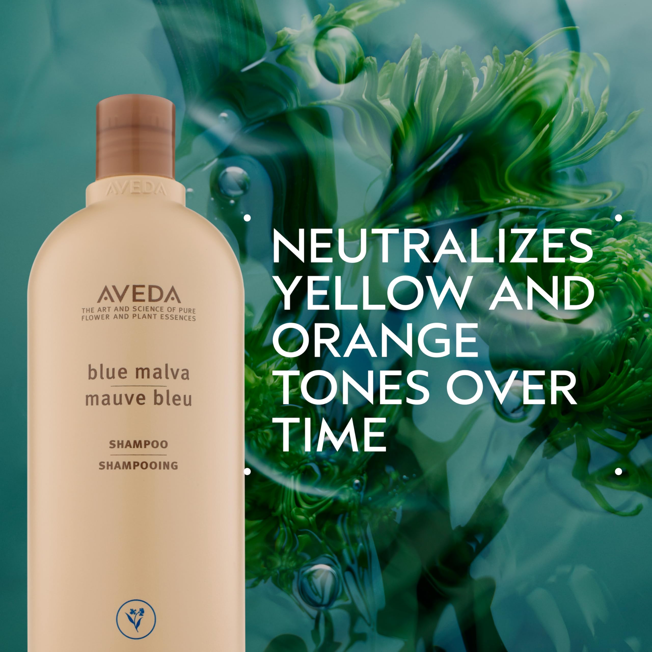 Aveda Blue Malva Shampoo lather to enhance cool tones on hair.