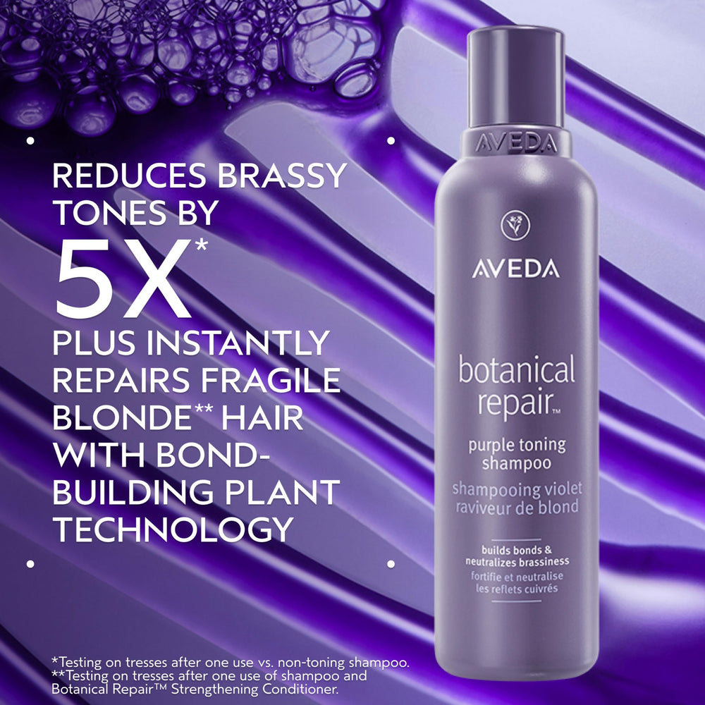 Close-up of Aveda purple toning shampoo lather brightening silver and grey hair.