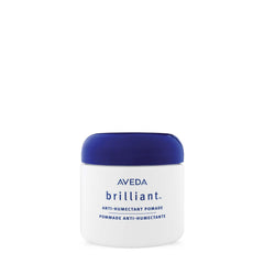 Aveda Brilliant Anti-Humectant Pomade bottle showcasing humidity protection for curly hair.