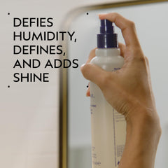 Aveda Brilliant Medium Hold Spray nozzle close-up for even mist and controlled application.