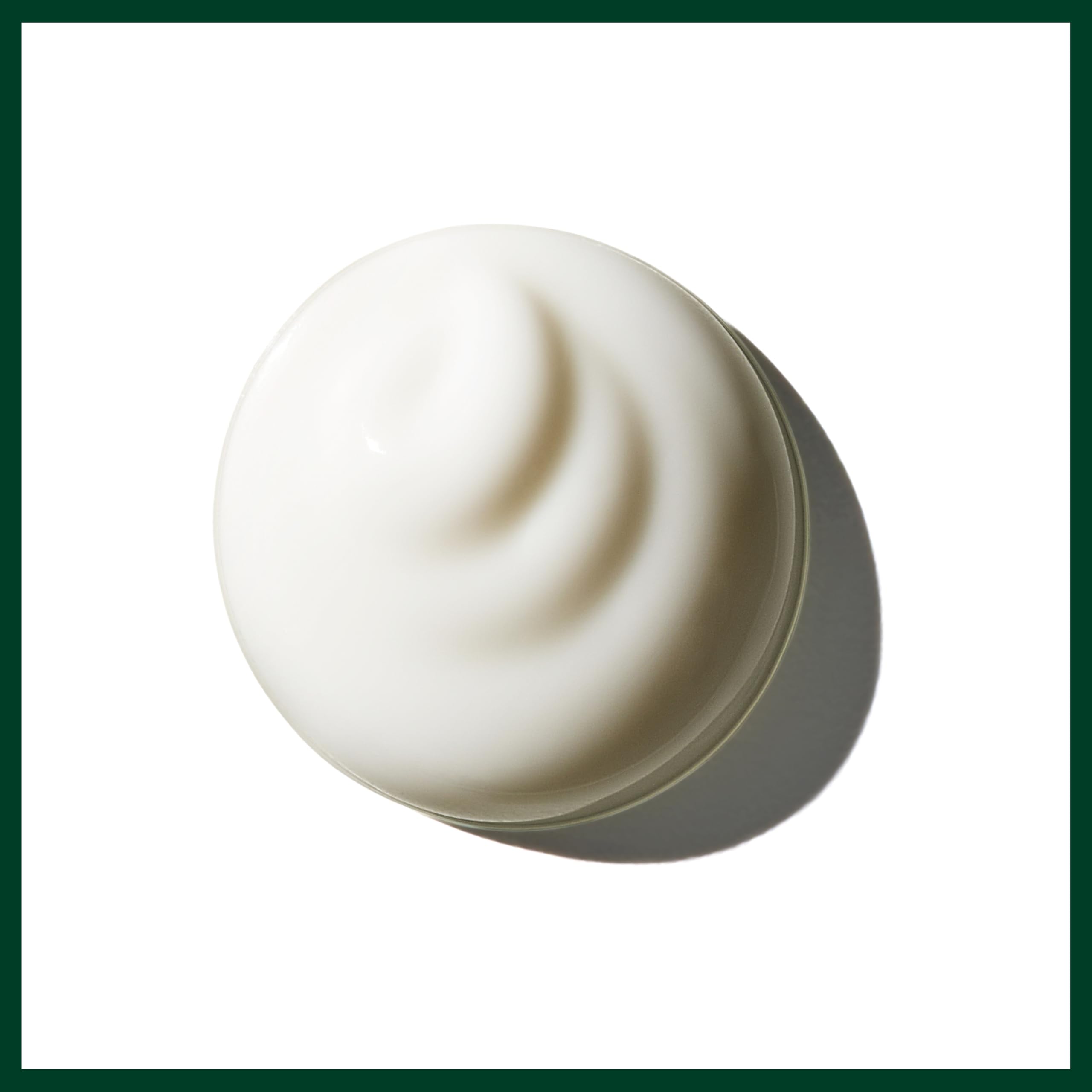 Aveda Brilliant Universal Styling Creme layered in small amounts for definition