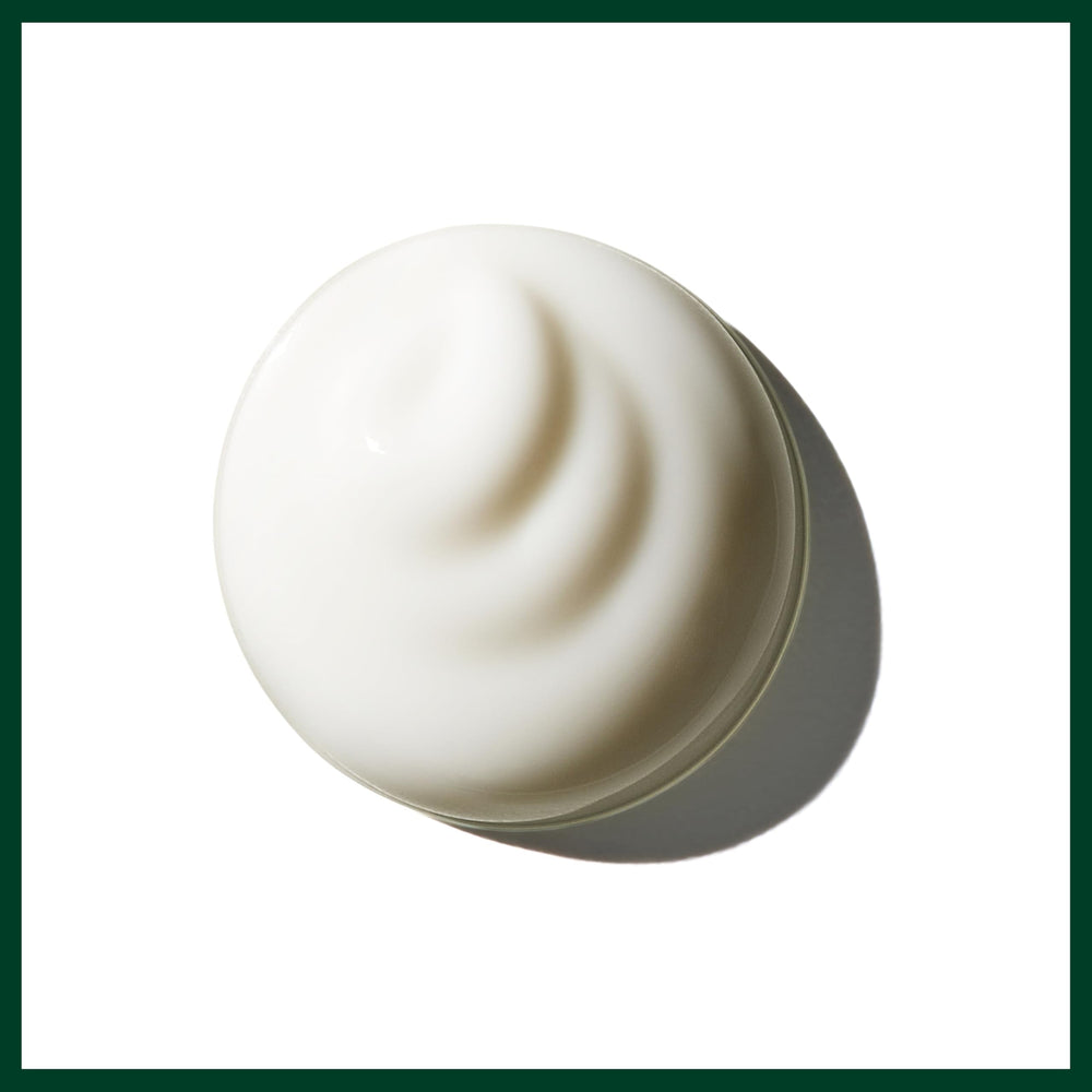 Aveda Brilliant Universal Styling Creme layered in small amounts for definition