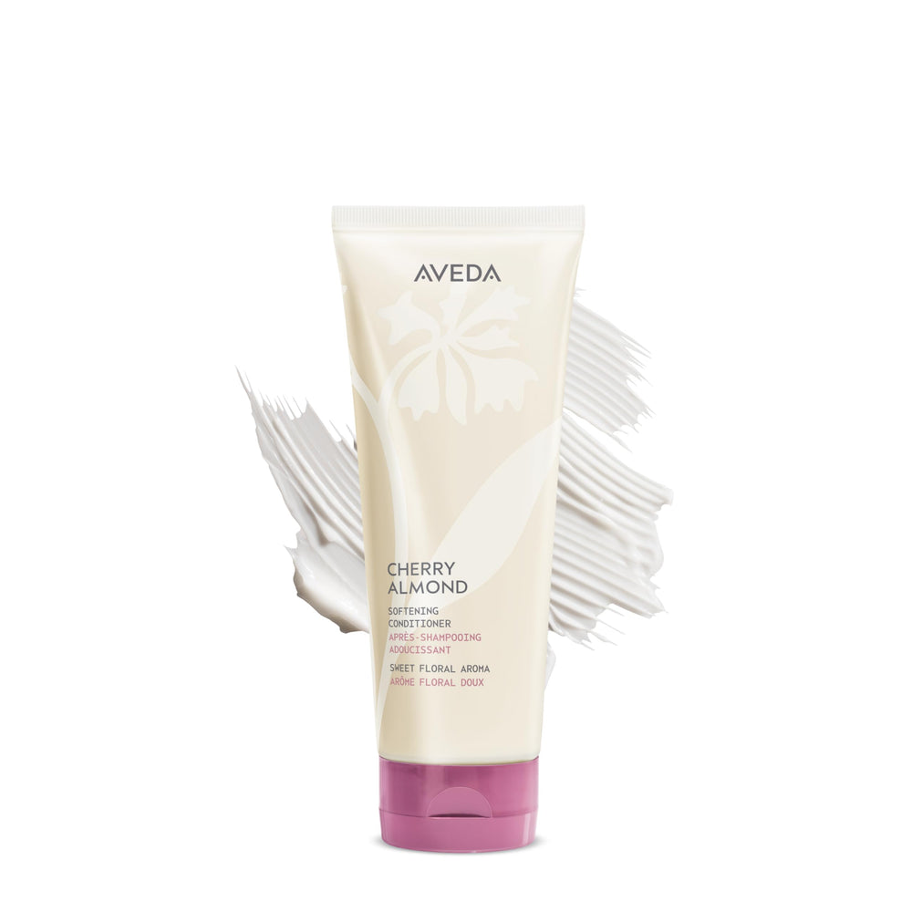 Aveda Cherry Almond Softening Conditioner bottle shows silicone-free formula for easy detangling.