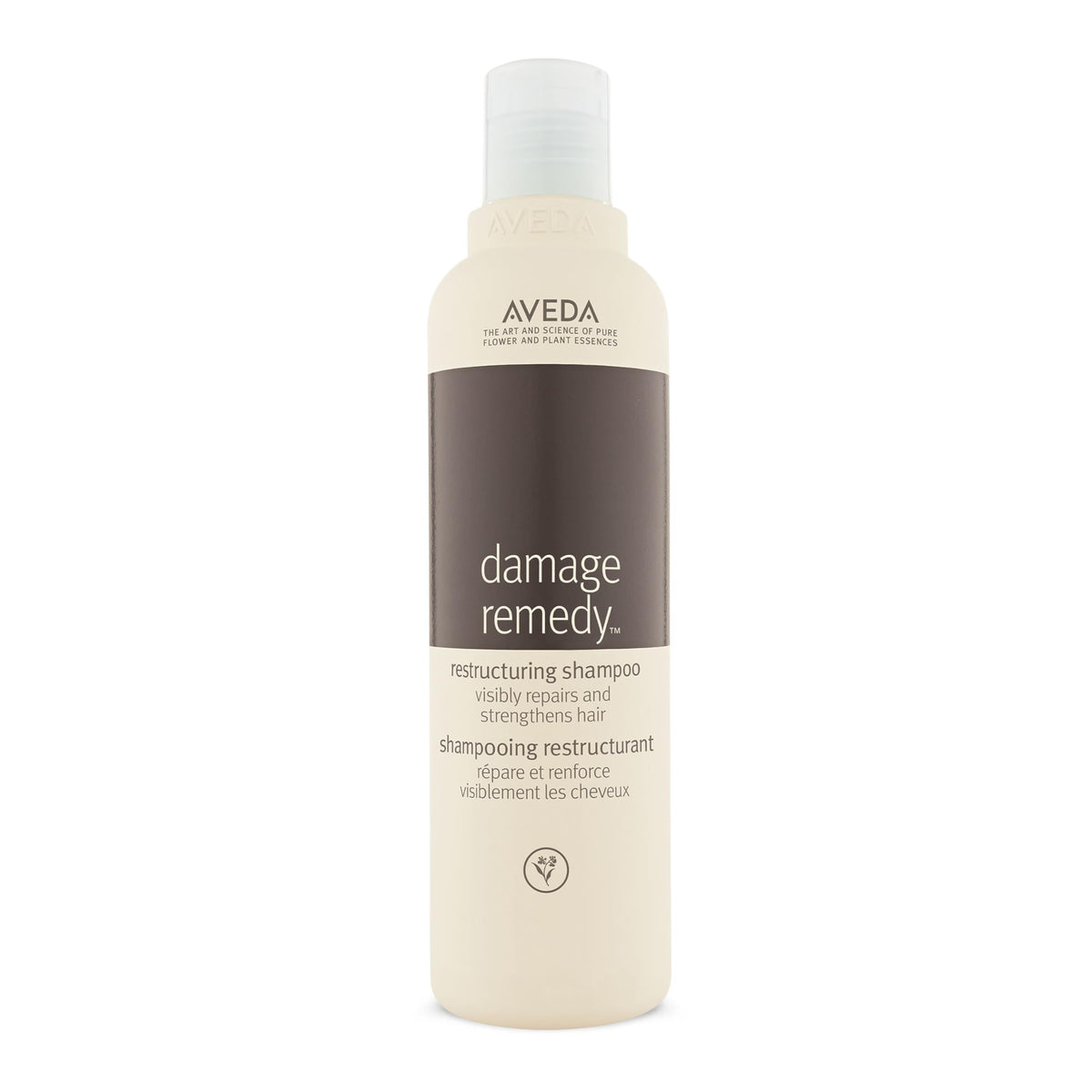 Aveda Damage Remedy shampoo bottle front shows repair and strengthening potential.