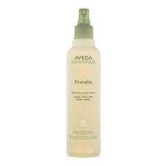 Aveda Firmata bottle showing firm hold and shine for lasting styles.