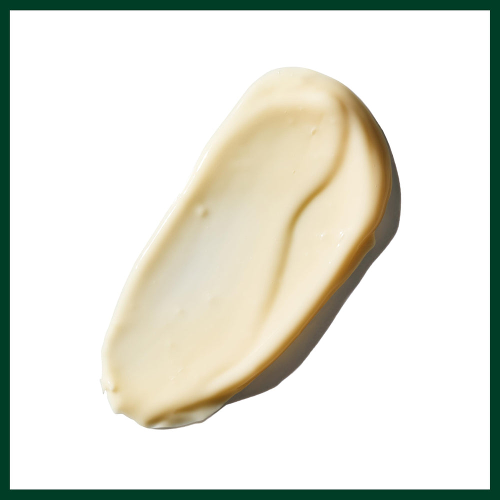 Hands applying Aveda Hand Relief Renewal Serum before bed