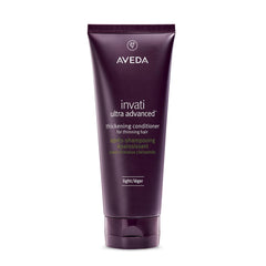 Aveda Invati Ultra Advanced Thickening Conditioner Light bottle on display, detangles and thickens delicate hair.