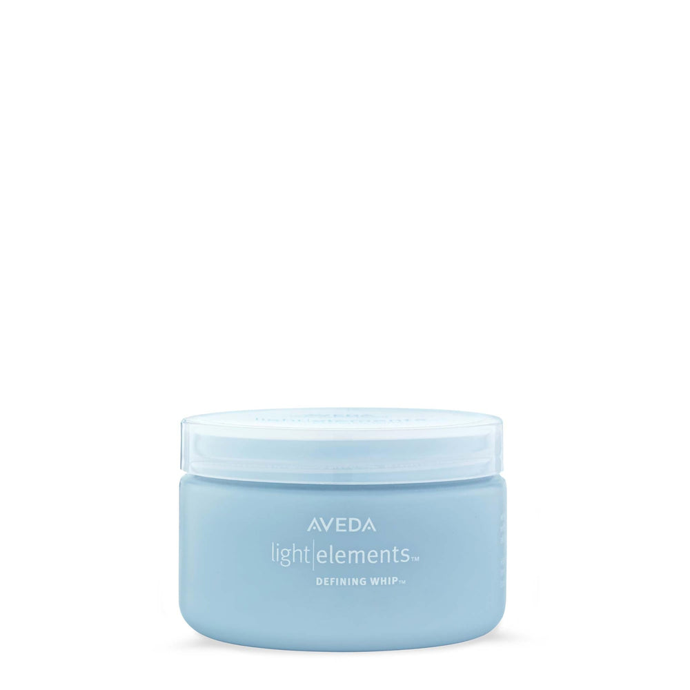Aveda Light Elements Defining Whip bottle shows lightweight texture for all hair types.