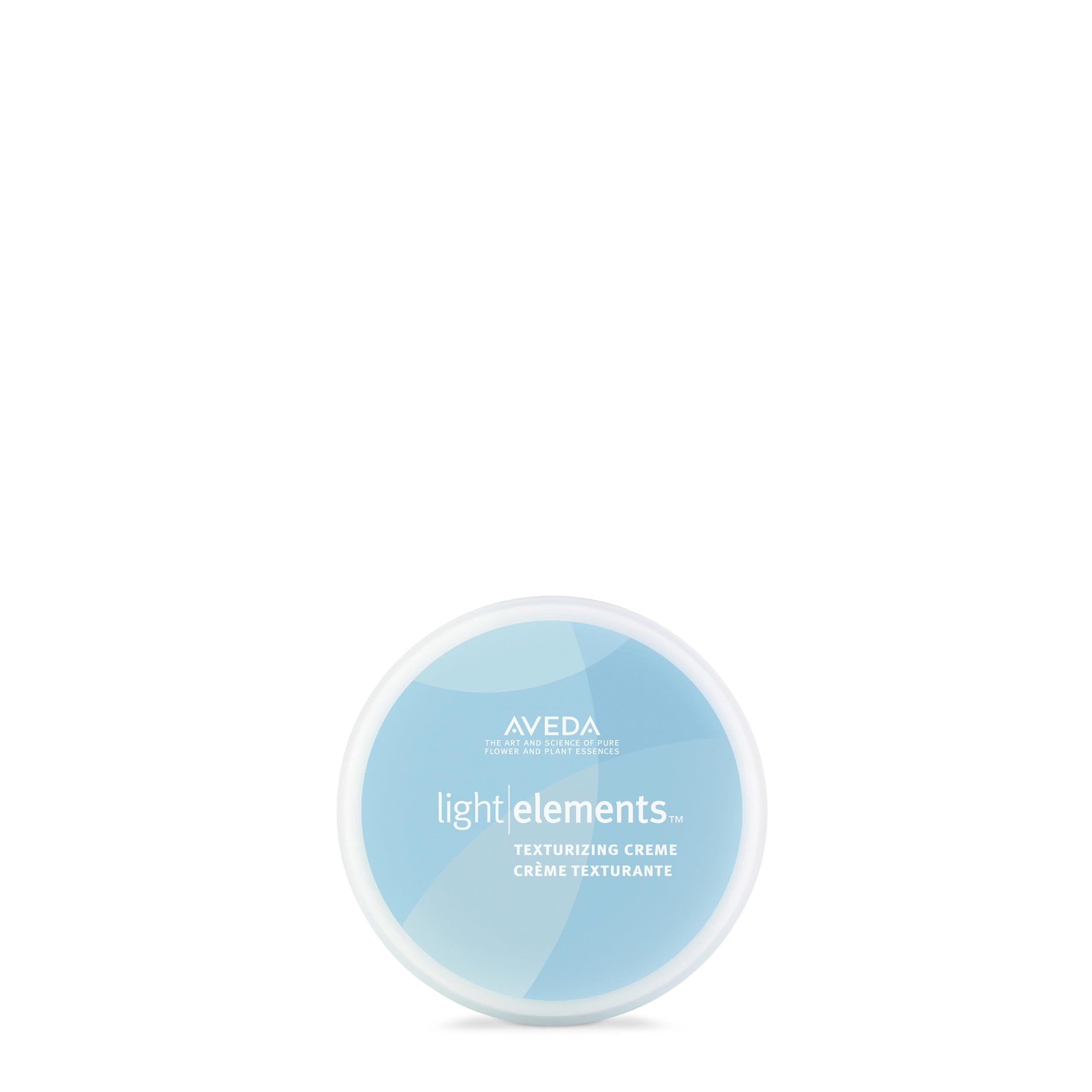 Aveda Light Elements Texturizing Creme bottle illustrating weightless hold for all hair types.