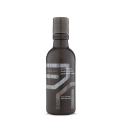 Aveda Men Pure-Formance Liquid Pomade bottle closeup for natural hold and shine