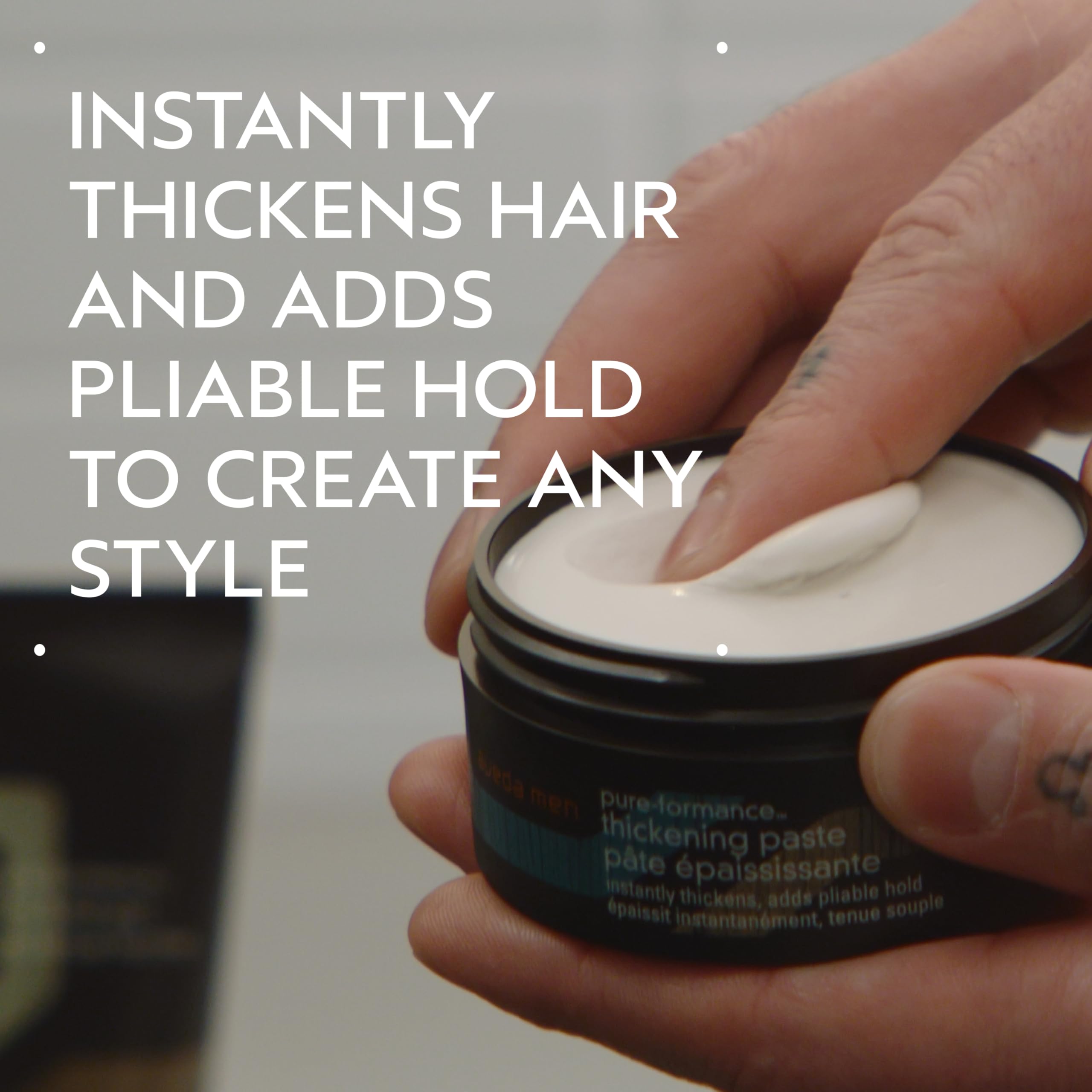 Hands apply Thickening Paste to damp hair for lift and thickness.