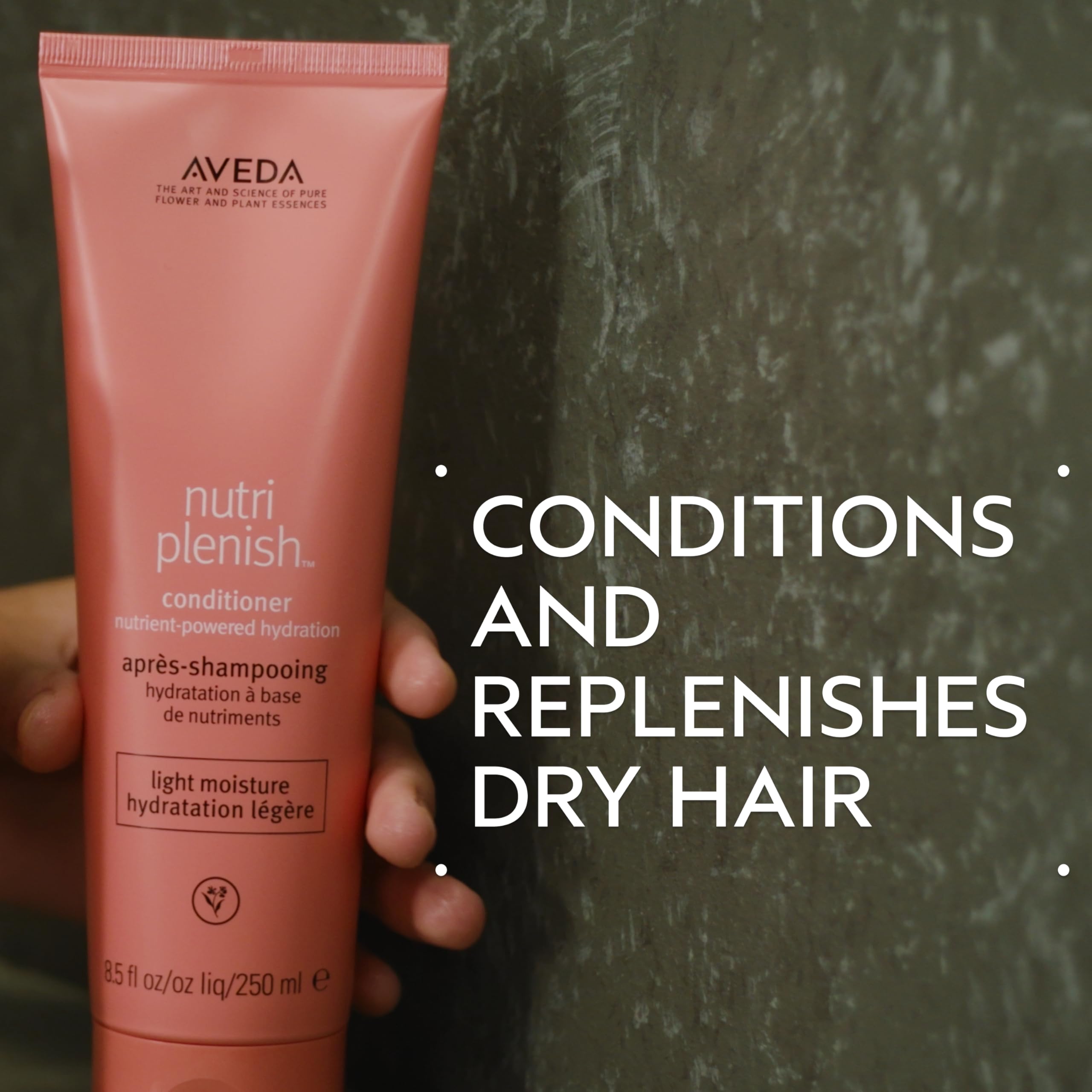 Aveda Nutriplenish Conditioner Light Moisture creamy texture ready for smooth application.