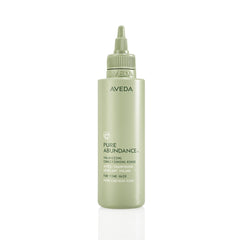 Aveda Pure Abundance conditioner bottle showing volume-boosting formula for fine hair.