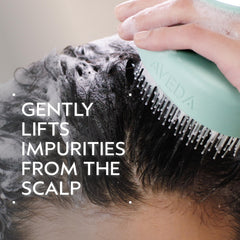 Aveda Scalp Solutions Stimulating Scalp Massager ergonomic handle for comfortable scalp care.