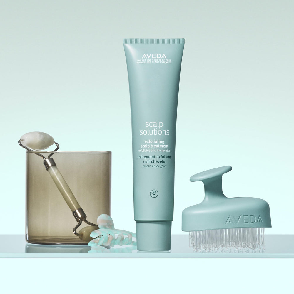 Aveda Scalp Solutions Stimulating Scalp Massager use on wet hair for thorough cleansing.