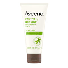 Aveeno Positively Radiant face scrub tube shown for daily cleansing and exfoliation.