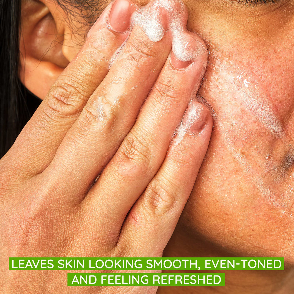 Aveeno Positively Radiant soy extract closeup highlighting moisture benefits for brighter skin.