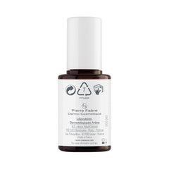 Close-up of Avène RetrinAL serum dropper for precise application