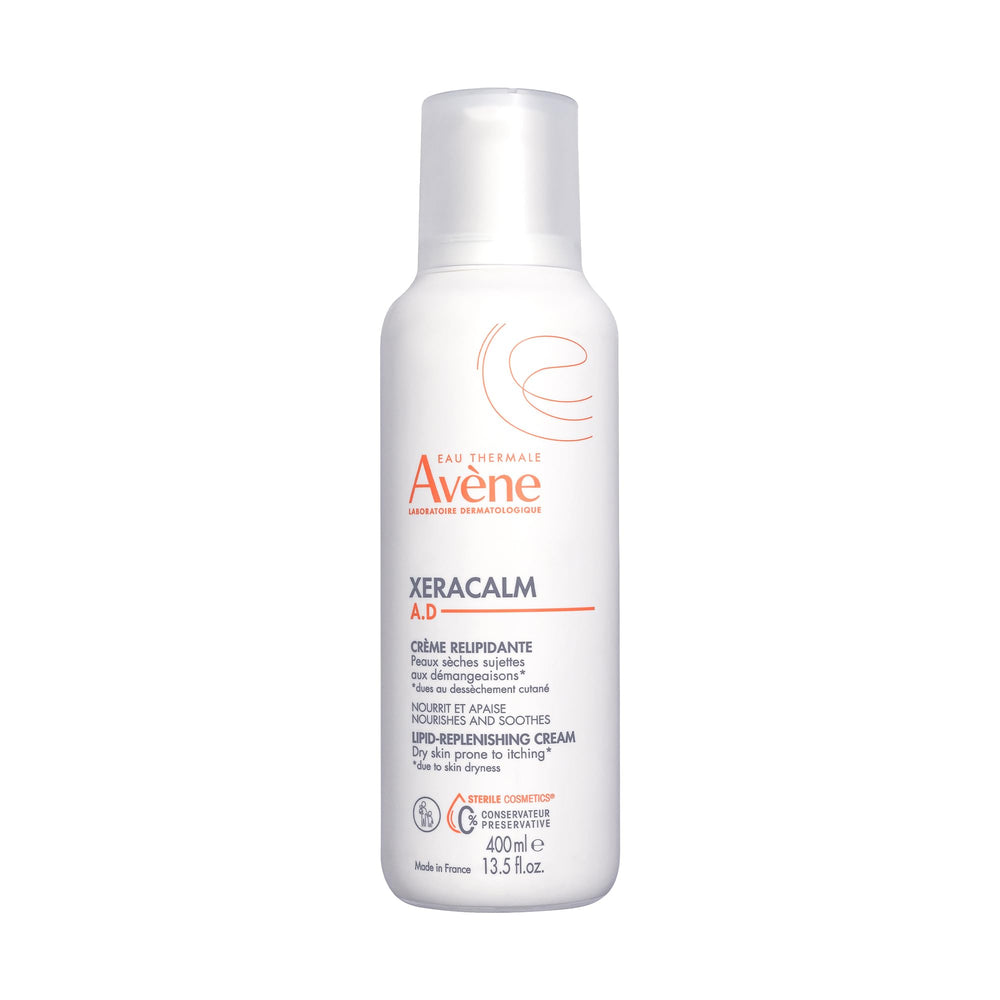 Avène XeraCalm A.D cream pump close-up showcasing a rich, non-greasy hydration for sensitive skin.