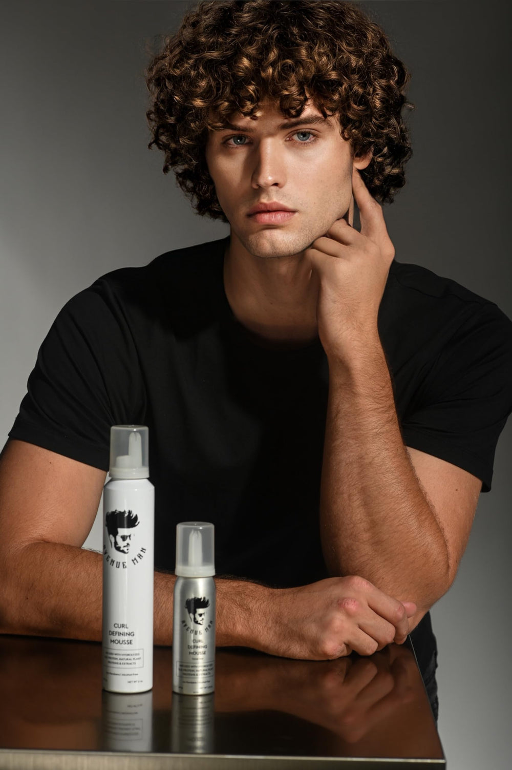 Avenue Man Curl Defining Mousse with green tea antioxidants for protection.