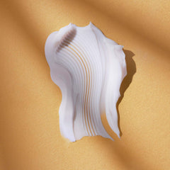 Close-up of AVON Anew Ultimate Firm and Supple Day Cream SPF20 texture for firming feel