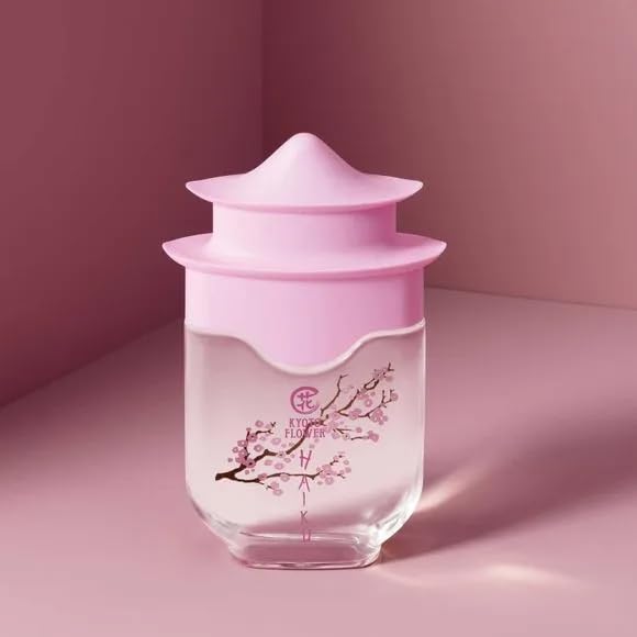 AVON Haiku Kyoto Flower amberwood base adding warm finish.