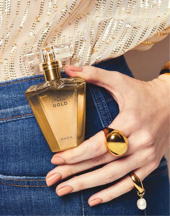 AVON Rare Gold amber glow close-up emphasizes warm golden amber notes.