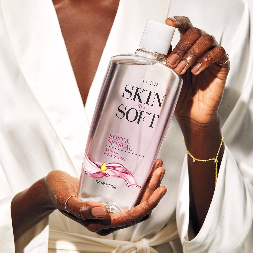 Leave-on moisturizer application with AVON Skin So Soft demonstrates all-day softness.