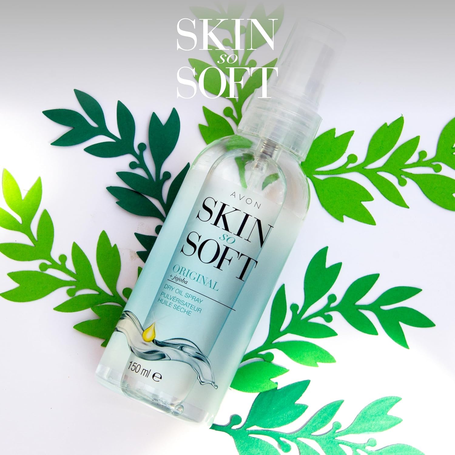 AVON Skin So Soft Original Dry Oil Spray pump-dispense close-up, silky non-greasy skin