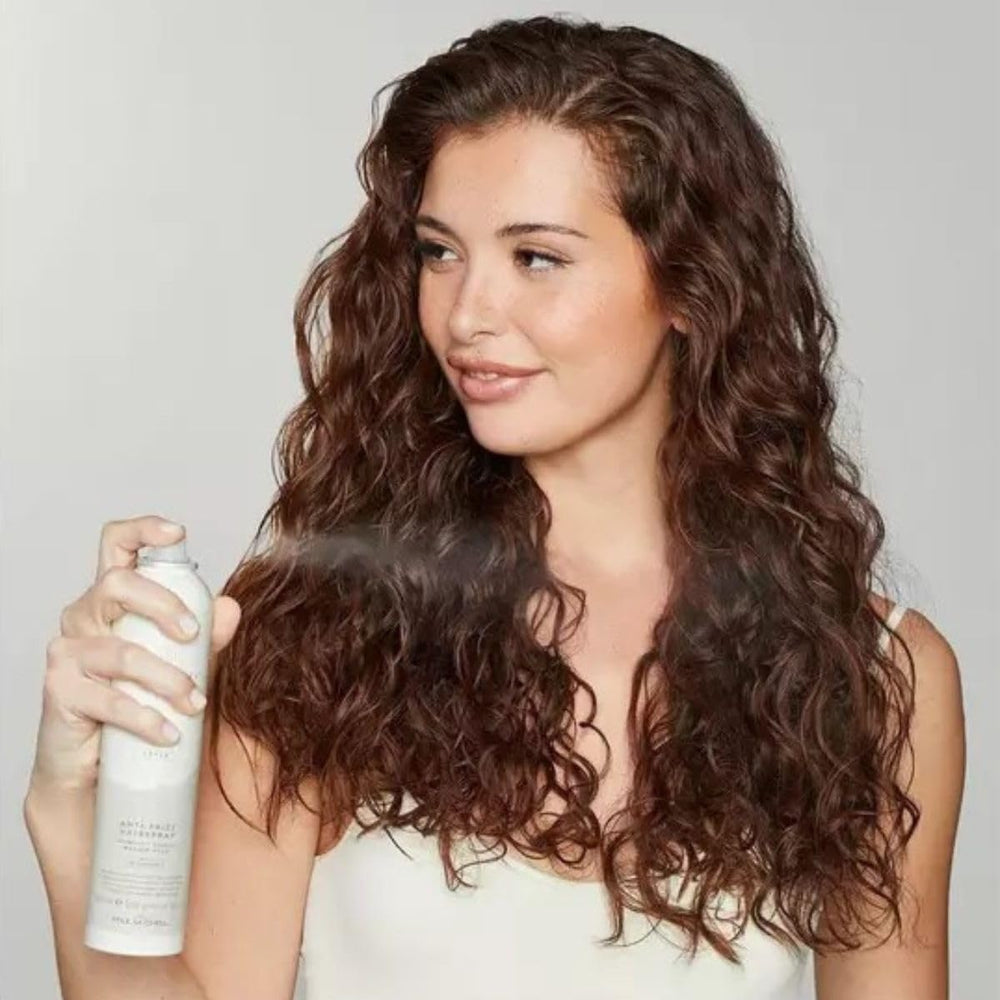 Awapuhi Wild Ginger hairspray in action delivering humidity-resistant hold