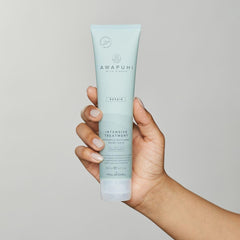 Close-up of creamy Awapuhi Wild Ginger treatment texture for hair conditioning.
