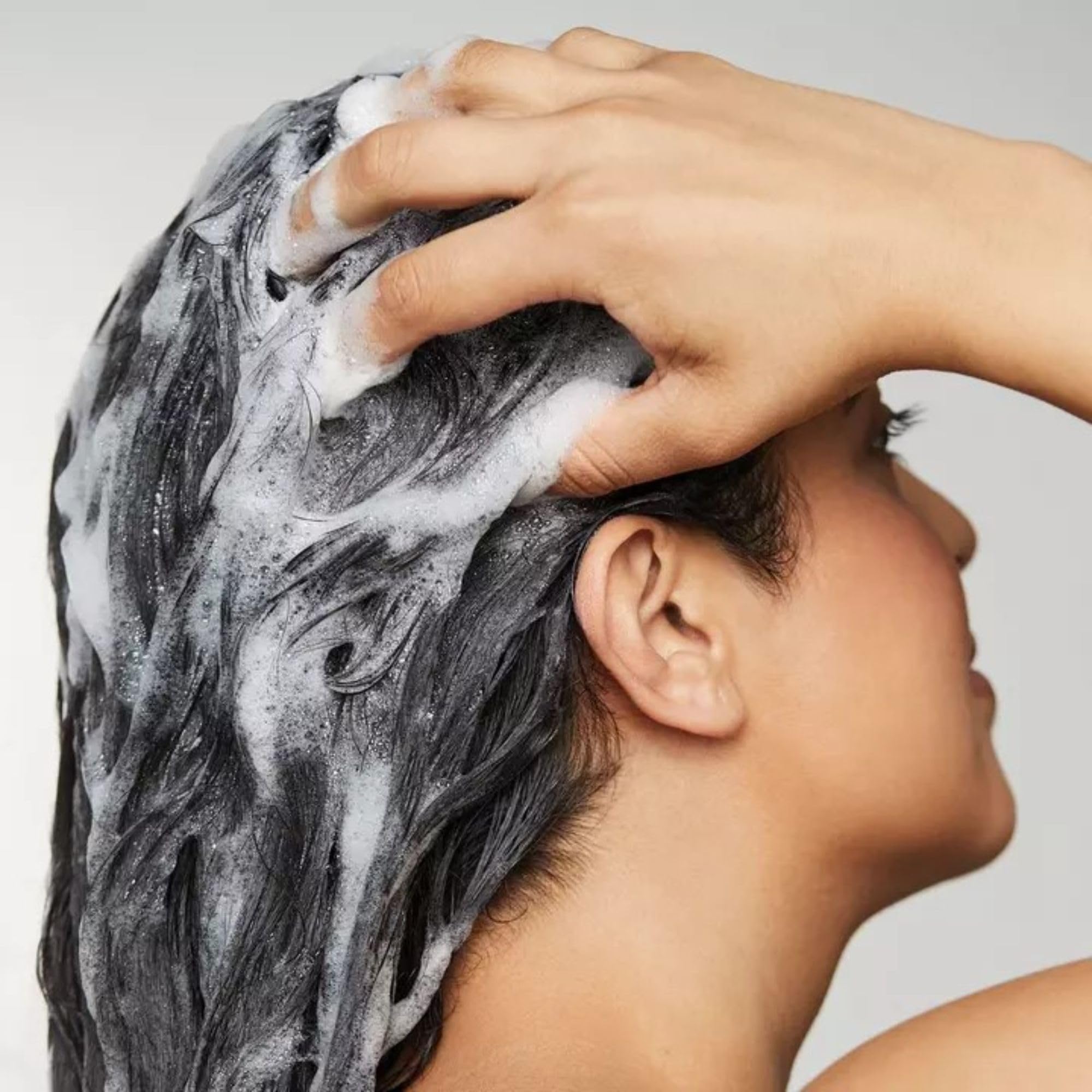 Awapuhi Wild Ginger Nourishing Shampoo color-safe formula preserves vibrancy without harsh sulfates