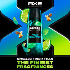 Applying AXE Aqua Bergamot spray for quick refresh