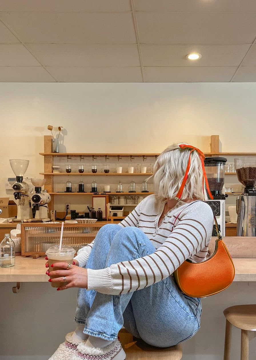 Ayesha orange hair bow clips for women and girls with long tails for versatile styles.