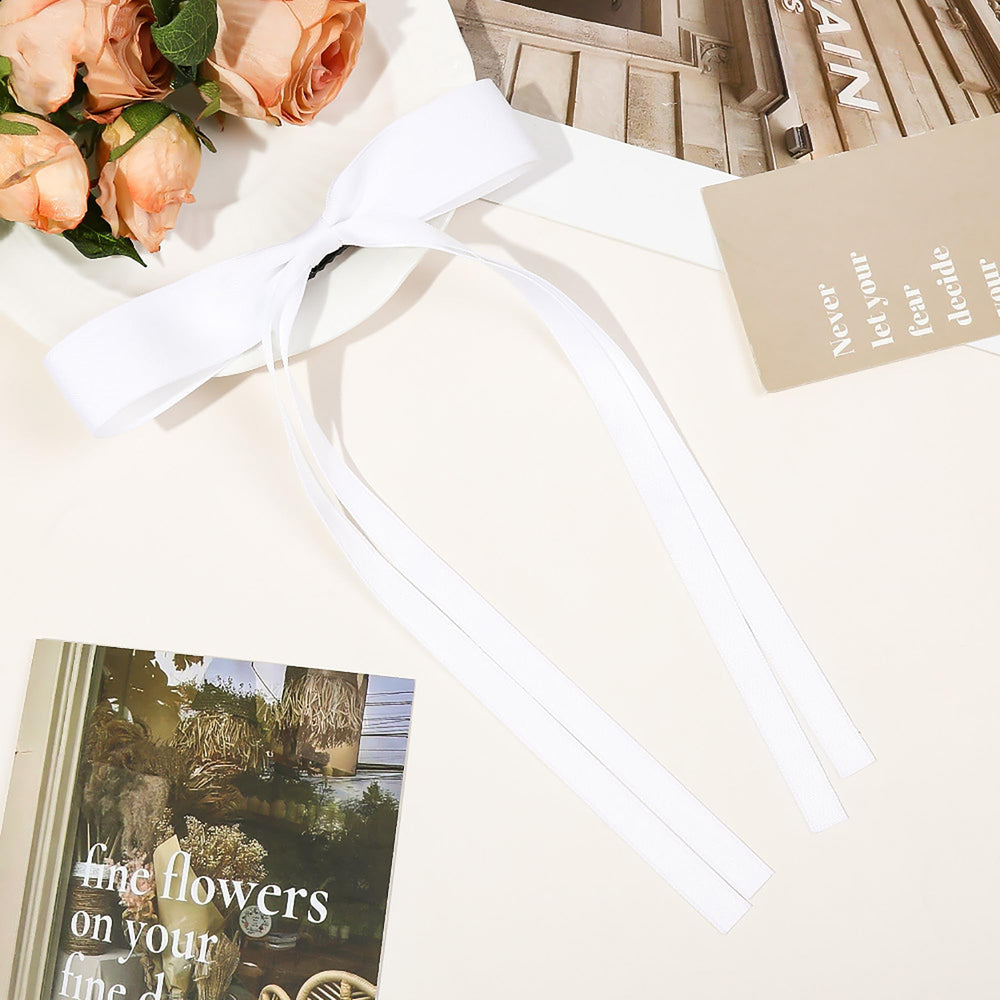 Ayesha white bow clips provide sturdy grip for busy daily hairstyles.