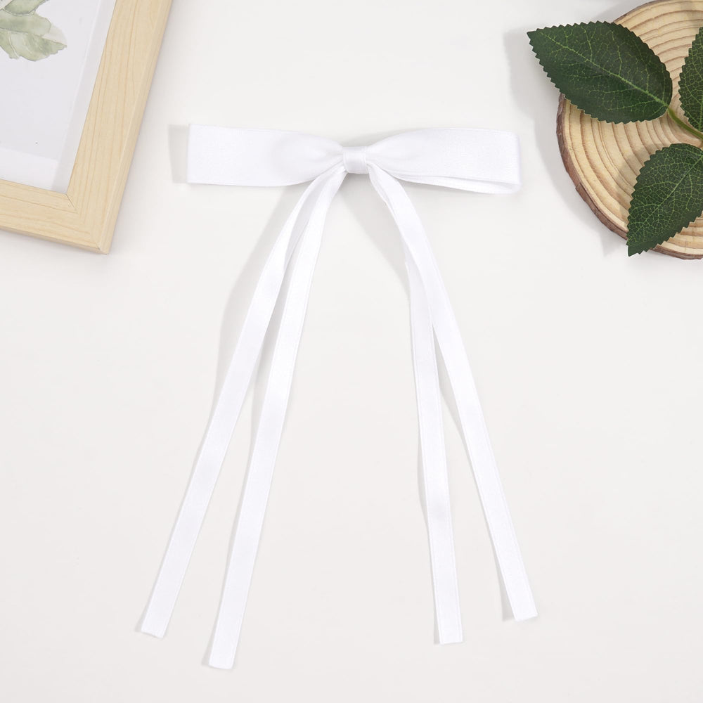 Ayesha bowknot clips with long tails stay in place through activities.