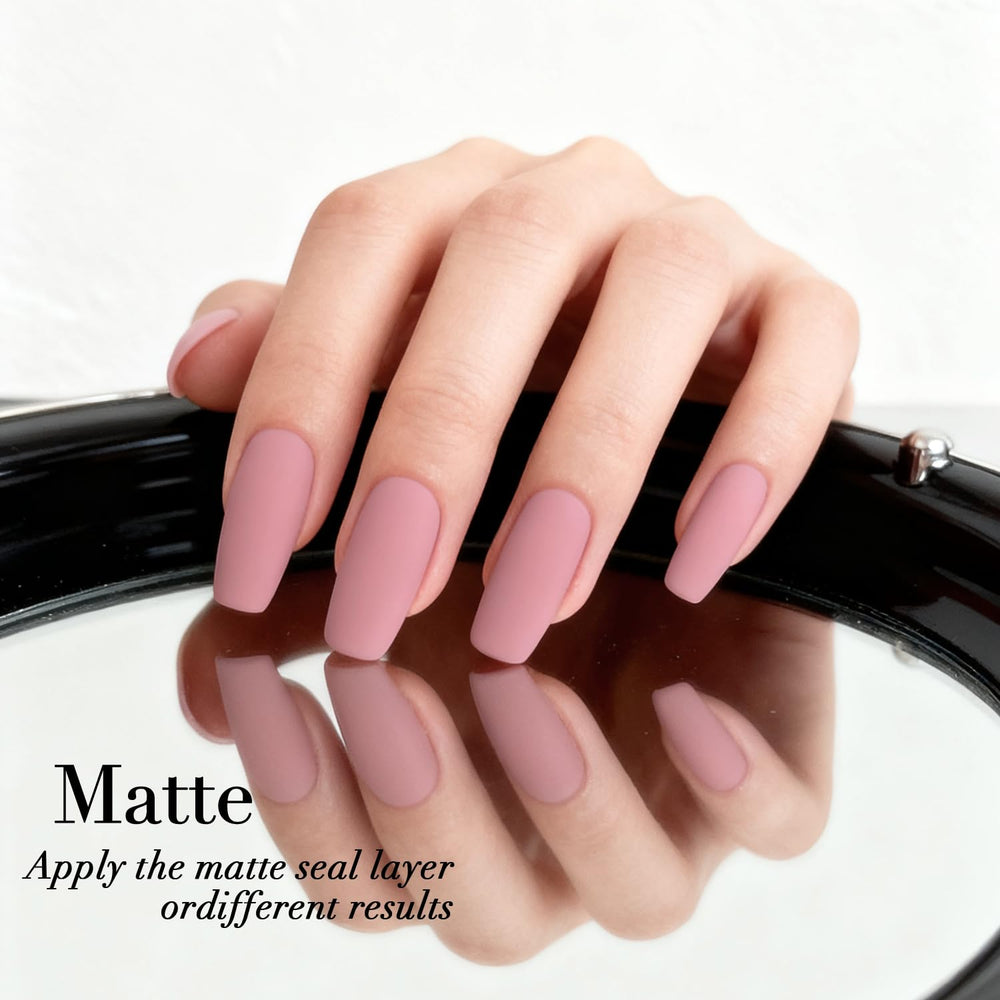 AZUREBEAUTY close-up of brush applying color for precise at-home manicure.