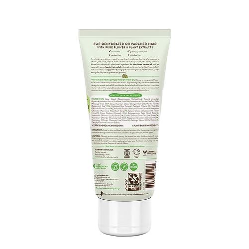 Acondicionador cremoso Babo Botanicals, textura suave para cabello tras playa o piscina.