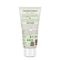 Acondicionador cremoso Babo Botanicals, textura suave para cabello tras playa o piscina.
