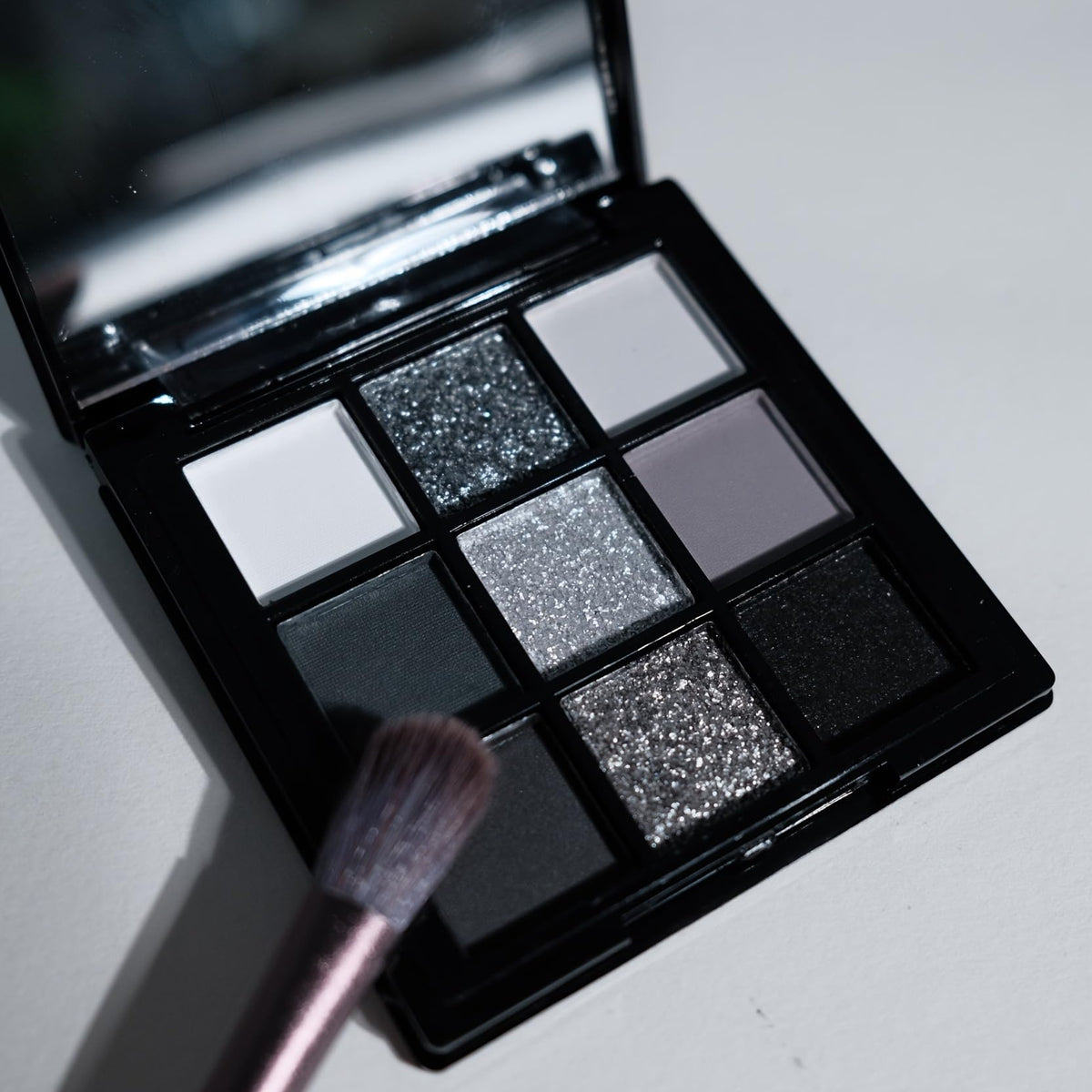 BAISEN DIARY 9 Color Smokey Eyeshadow Palette, black matte shade for dramatic looks.