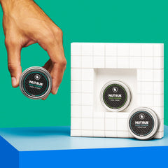 Ballsy Ball Rub packaging highlights compact design and lasting scent.