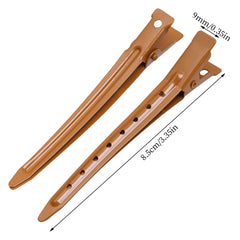 Bantoye brown duck bill clip used for hair sectioning during styling.