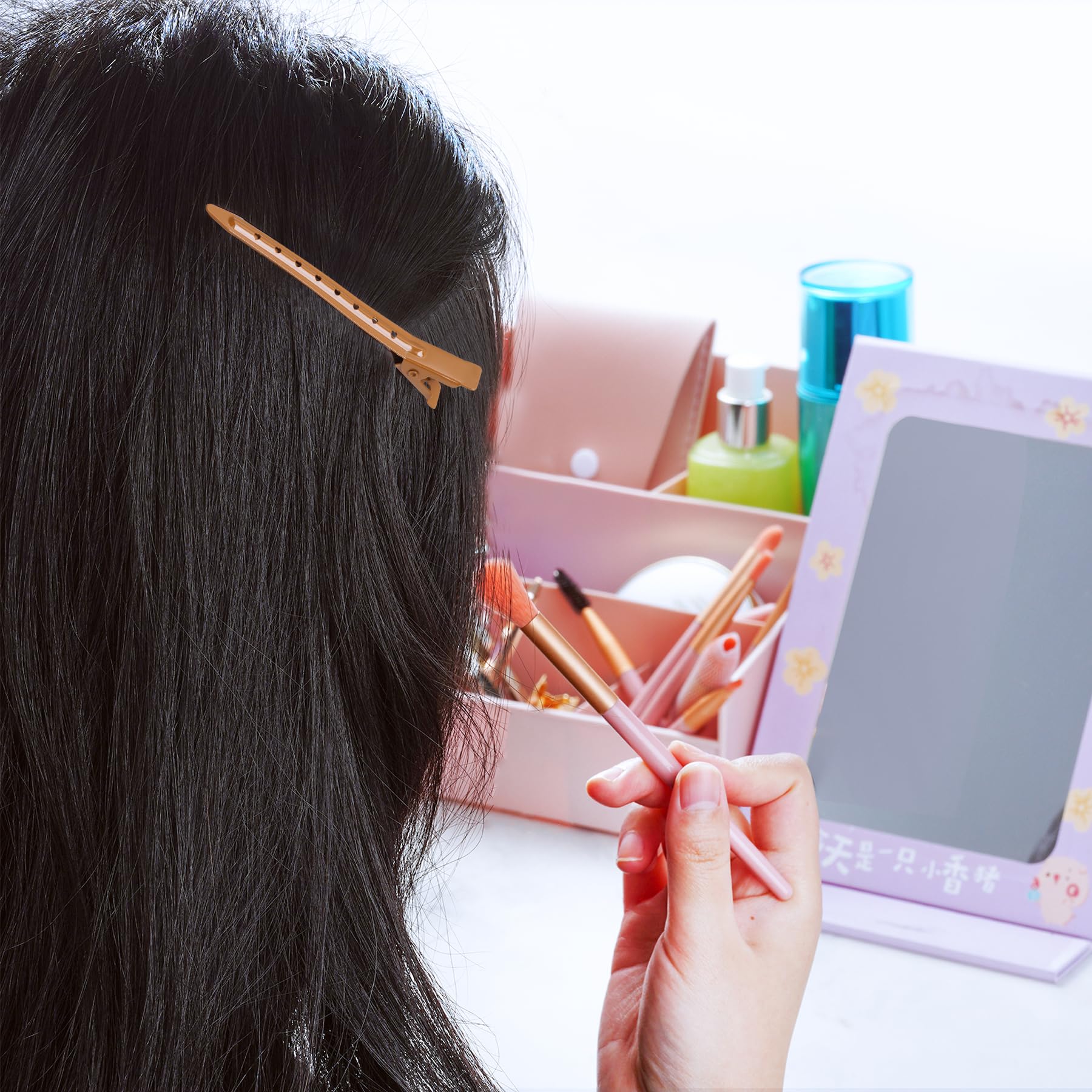 Bantoye hair clip in brown securing sections for clean styling.
