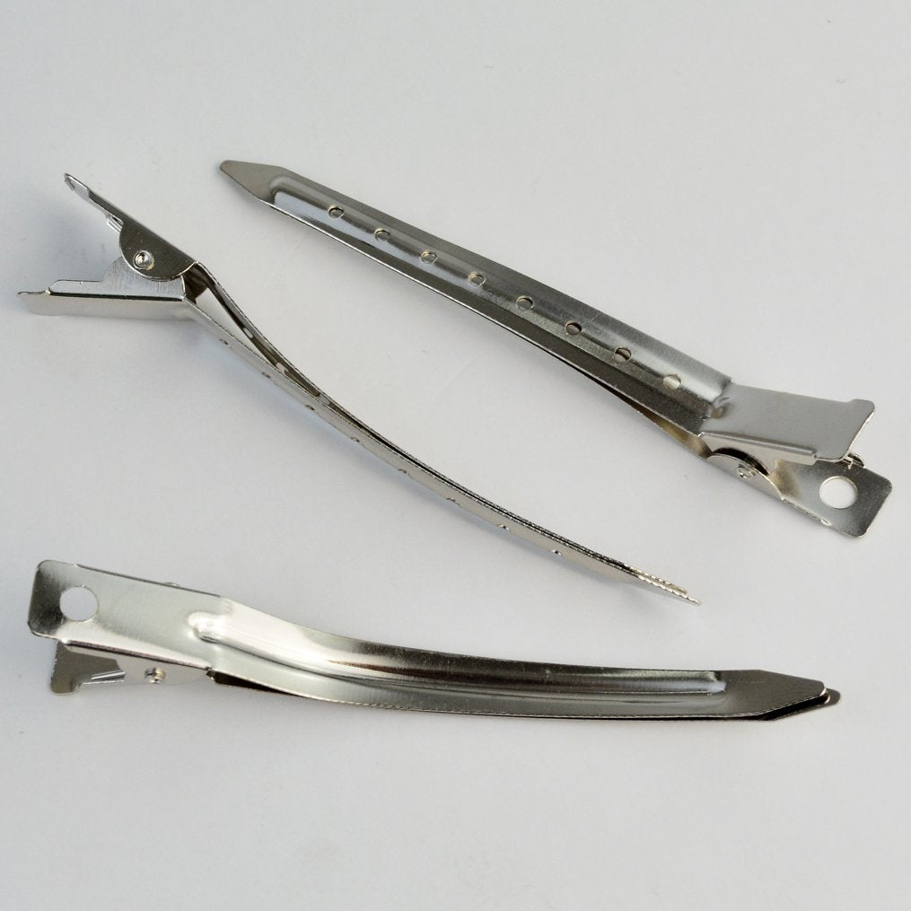Bantoye clip holds hair during drying or setting in a professional routine.