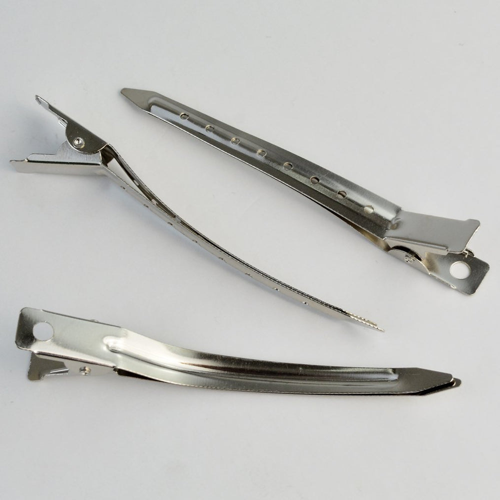 Bantoye clip holds hair during drying or setting in a professional routine.
