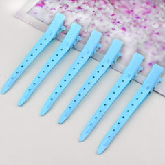 Bantoye hair-sectioning clip demonstrates precise division of sections