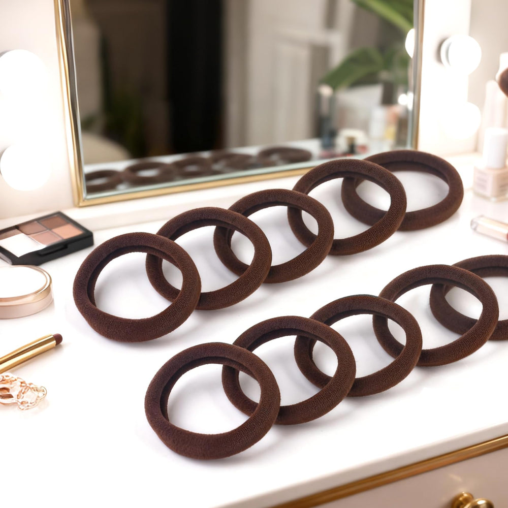 BAOLI 100pcs brown hair ties in pearly bag for easy storage.