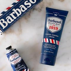 Barbasol 1919 Classic Shaving Cream aloe-oil-shea blend image, conveying skin nourishment and protection.