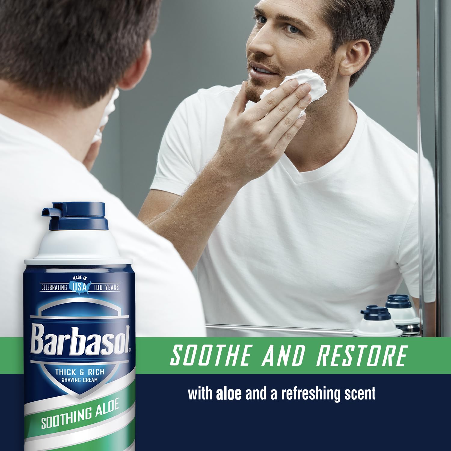 Front view of Barbasol Soothing Aloe bottle with foamy lather.